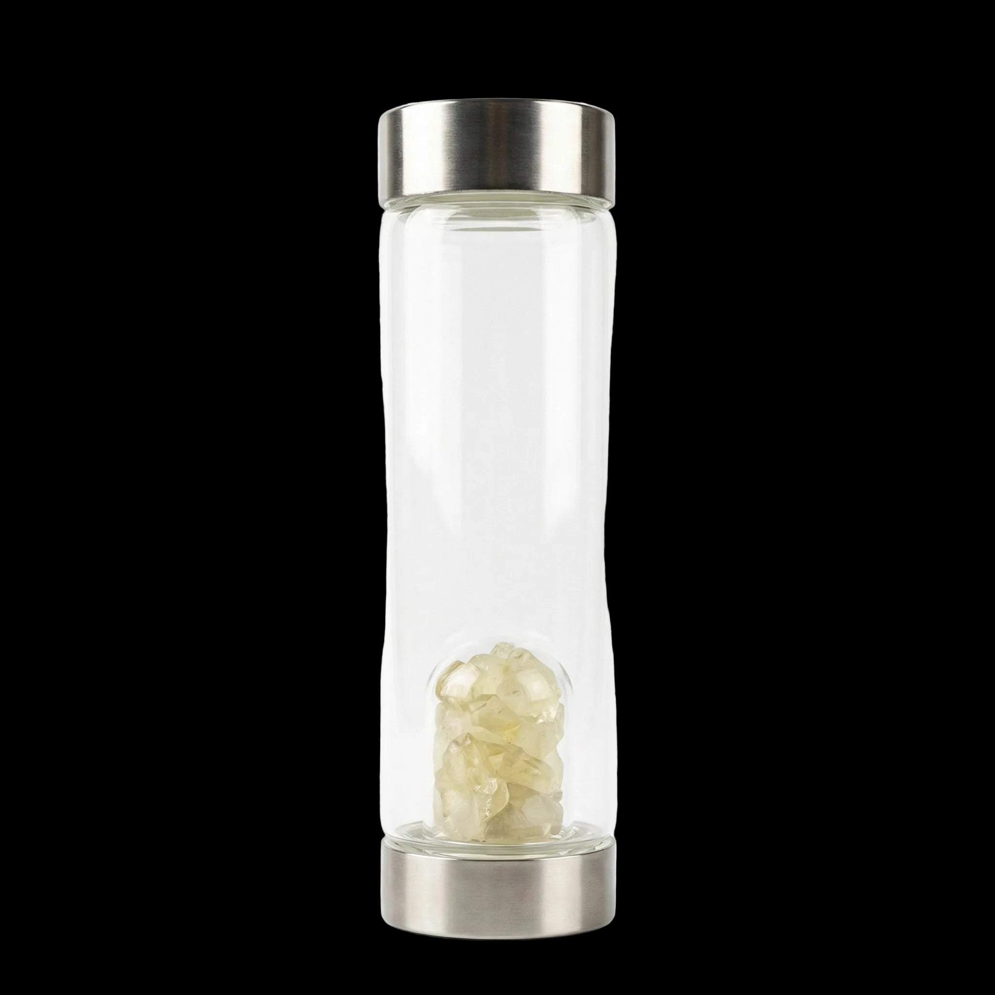 Clear glass bottle with silver cap containing a yellow crystal on a white background