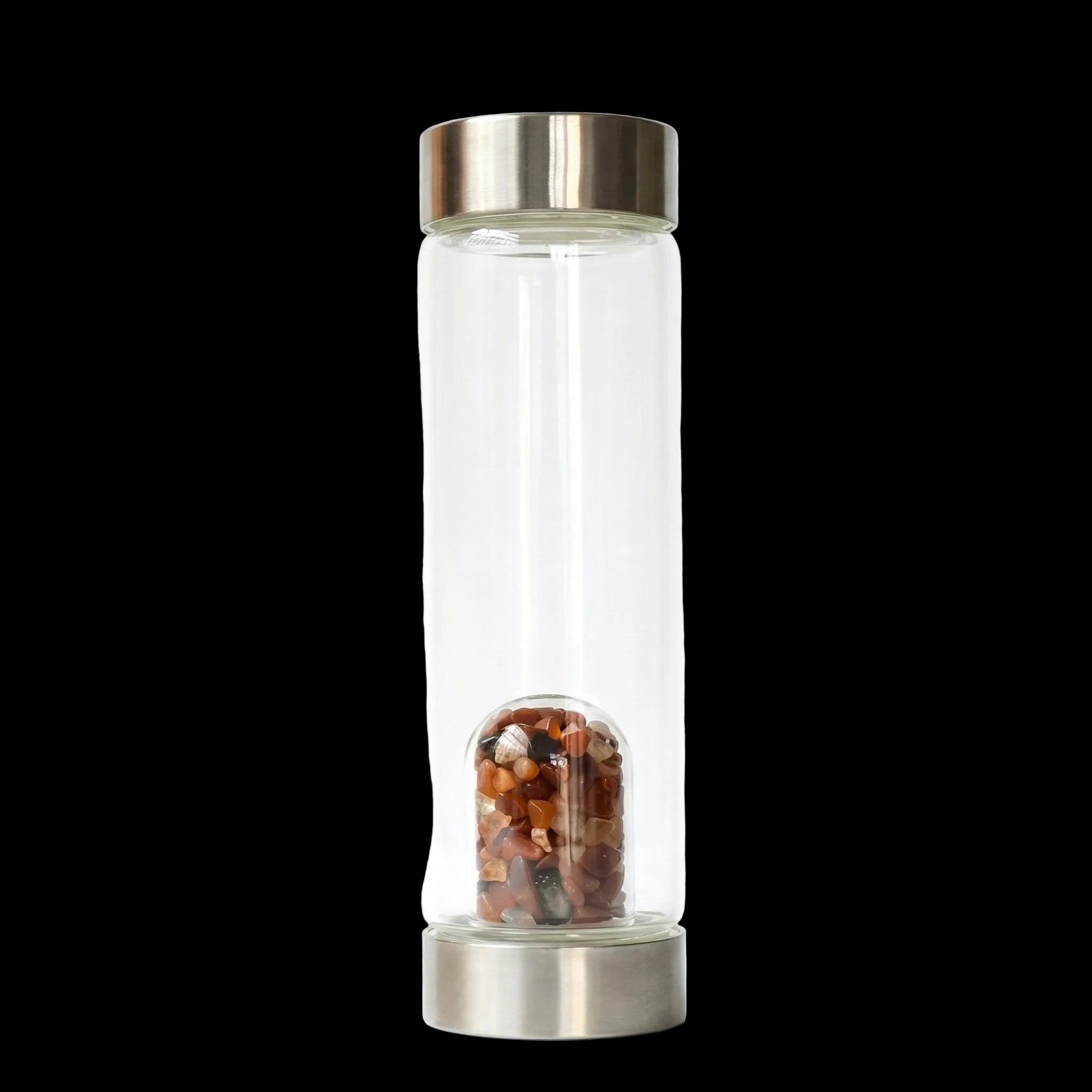 Clear glass container with metal lid and base on a white background